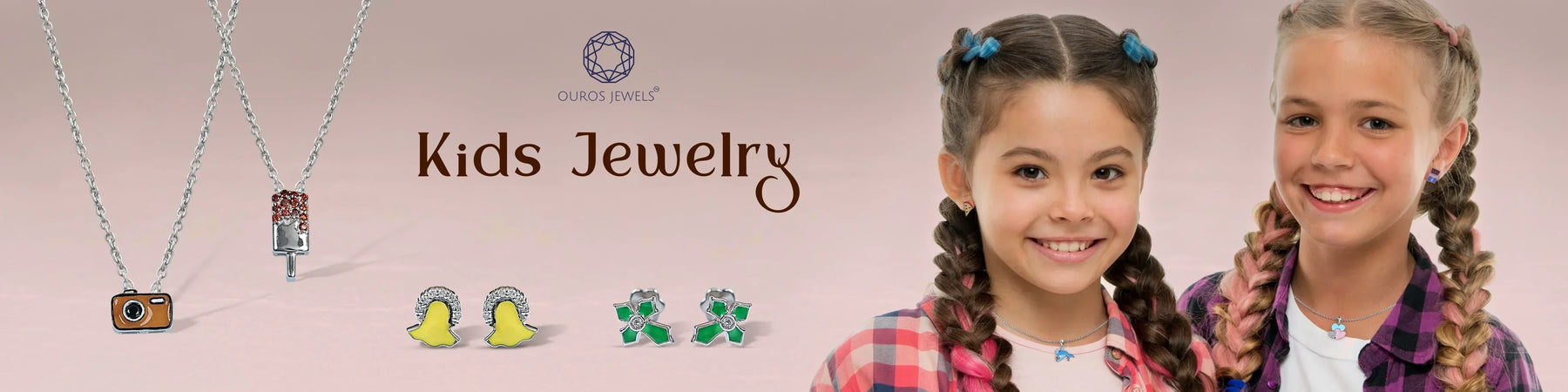 Image showing Young girl wearing a necklace with two kid’s jewelry pendants displayed beside her