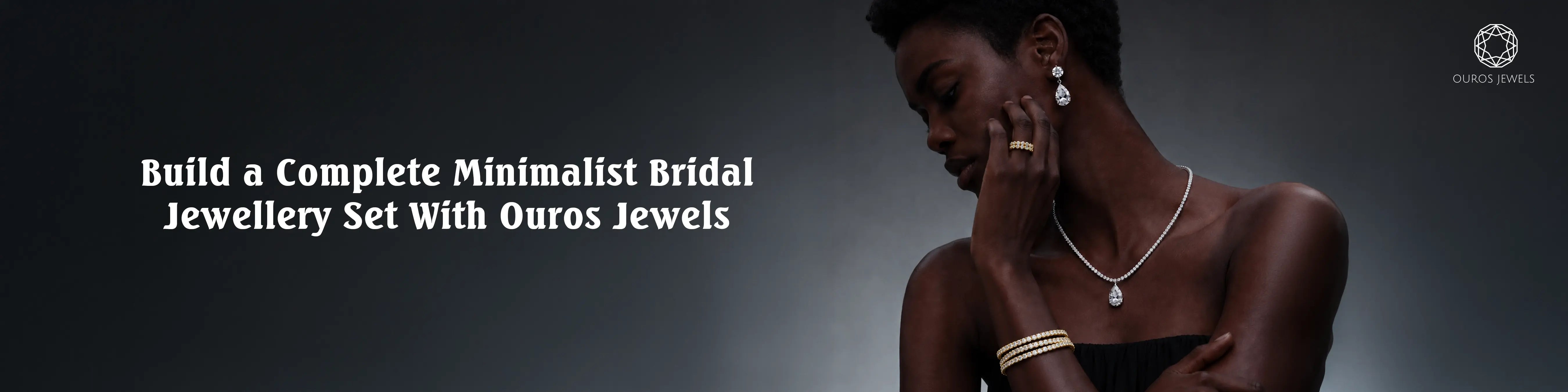 Model wearing lab grown diamond drop earrings, tennis necklace and gold bracelet by Ouros Jewels