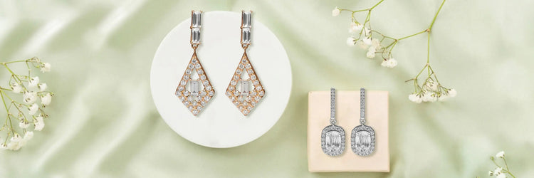 A high-quality image of a pair of cluster Dangal drop earrings featuring multi-cut lab-grown diamonds
