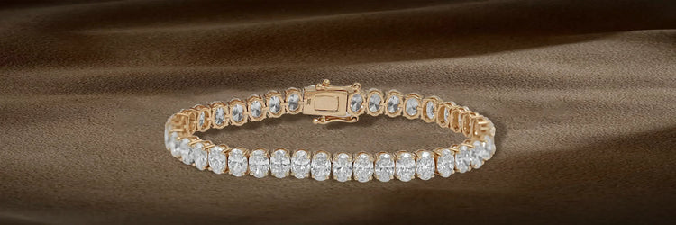  image Showing luxurious women's stackable tennis bracelet featuring emerald-cut lab-grown diamonds
