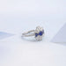 Sapphire Round And Tapered Baguette Diamond Cluster Ring