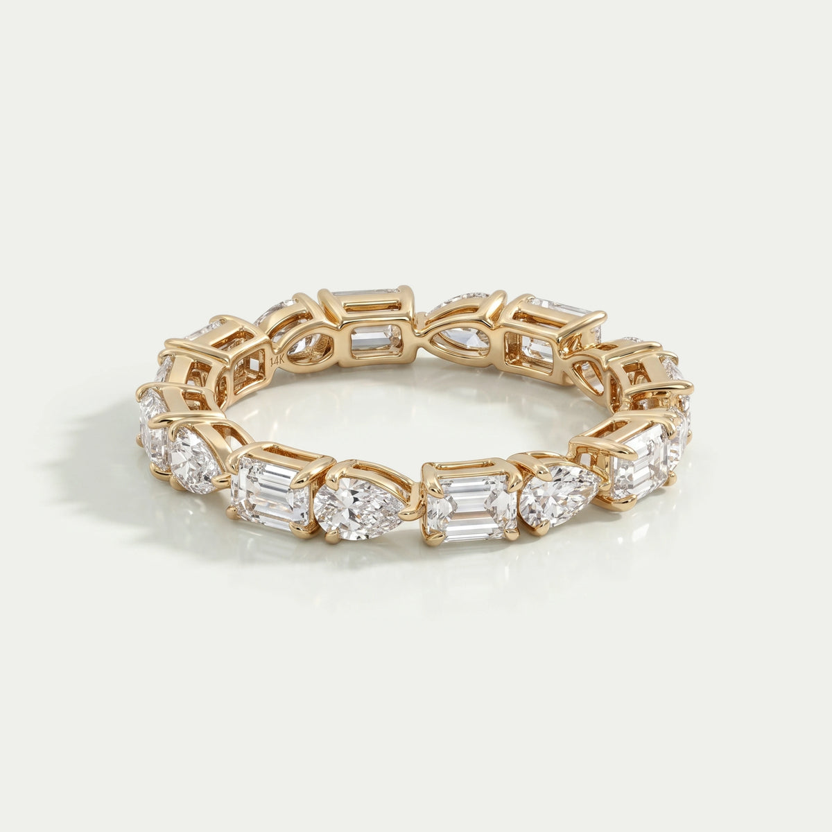 East West Pear And Emerald Diamond Eternity Wedding Band