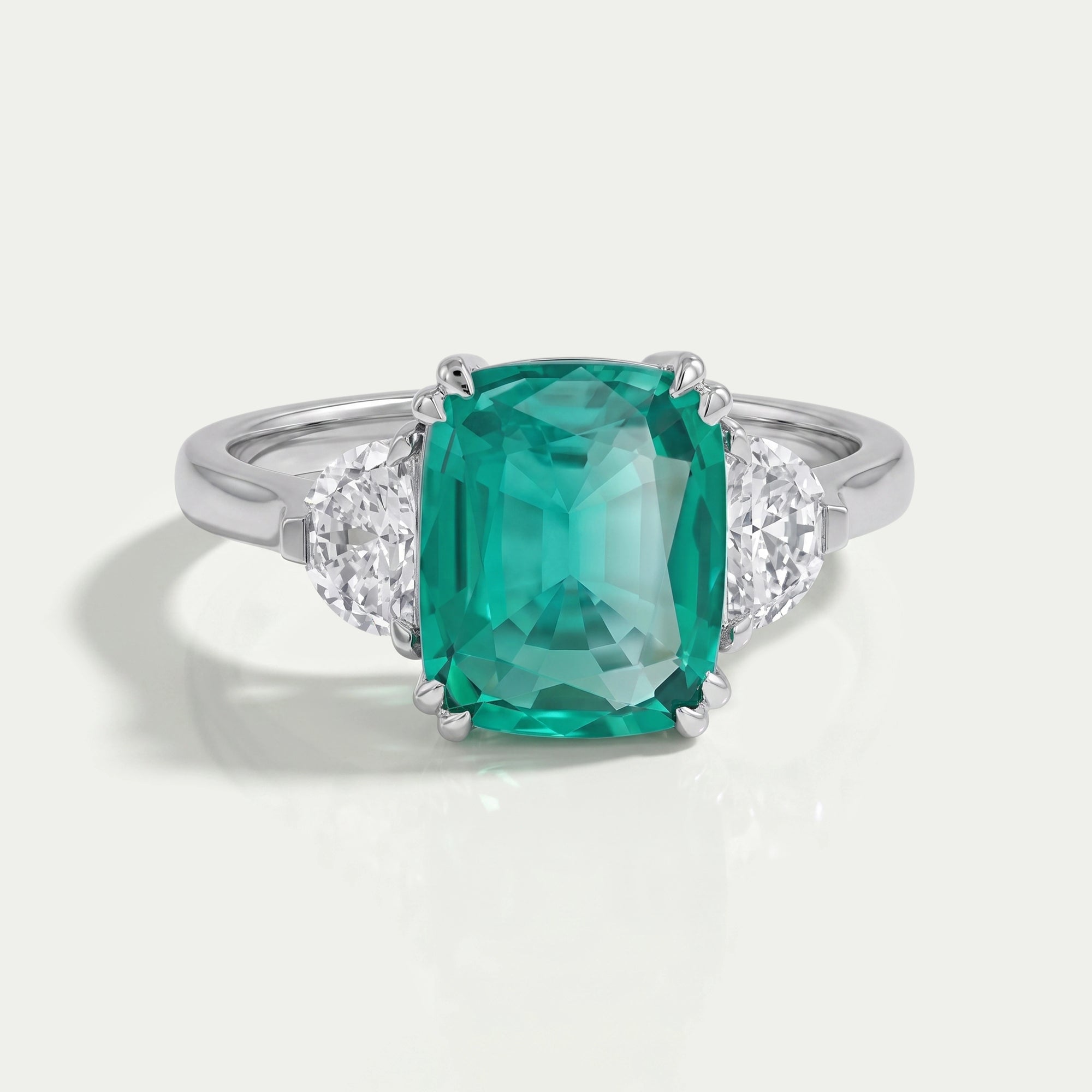 Green Cushion And Half Moon Trio Engagement Ring Rings