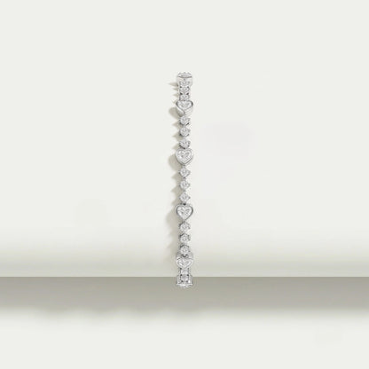 Armband mit Herz- und runden Diamanten in Lünettenfassung