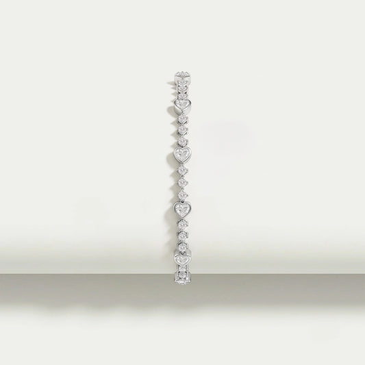 Armband mit Herz- und runden Diamanten in Lünettenfassung