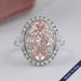 Pink Oval Cut With Trapezoid Accent Halo Engagement Ring Rings
