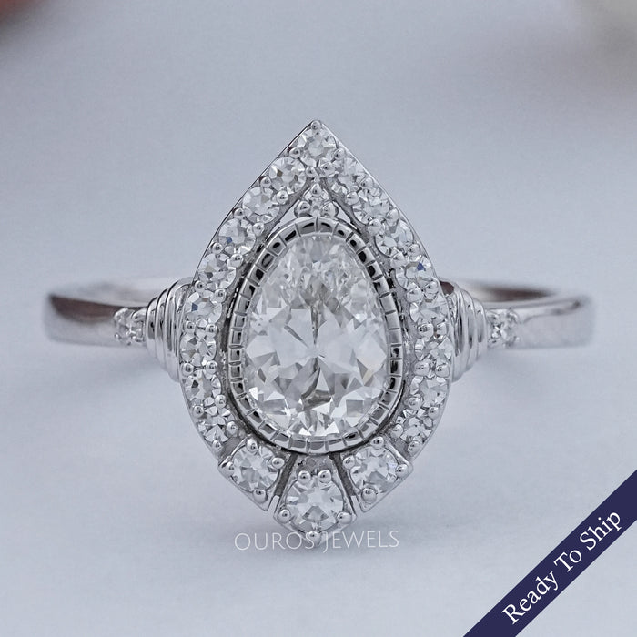 Old Mine Pear Cut And Single Round Halo Engagement Ring