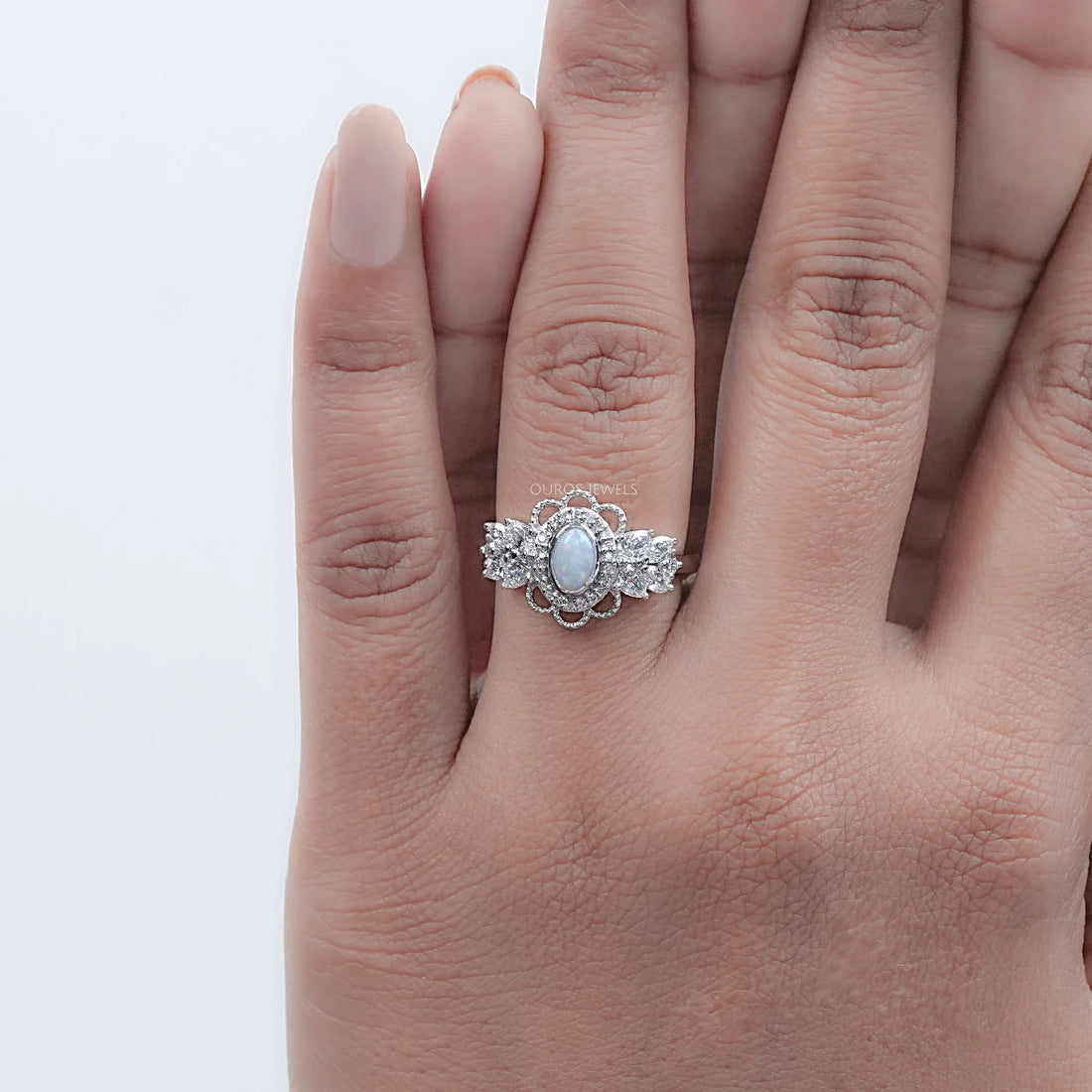 Opal Oval Cut And Halo Diamond Floral Engagement Ring
