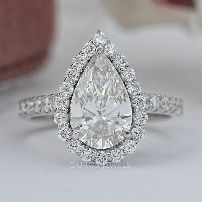 Pear Cut Halo Solitaire Accent Engagement Ring