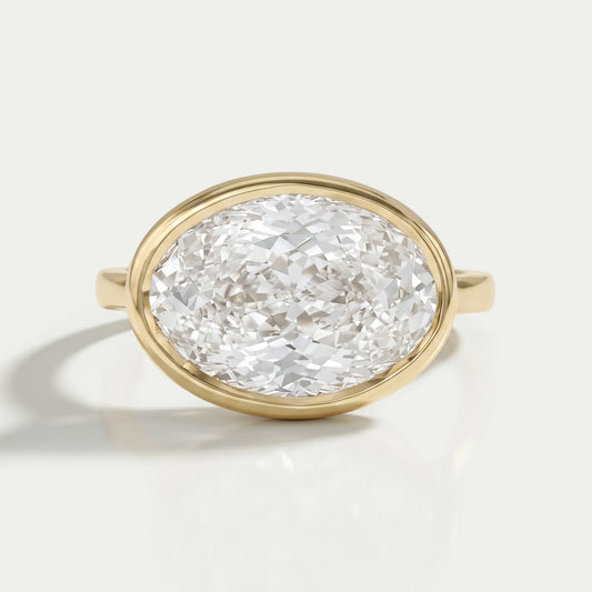 East West Portuguese Oval Bezel Set Engagement Ring Ring