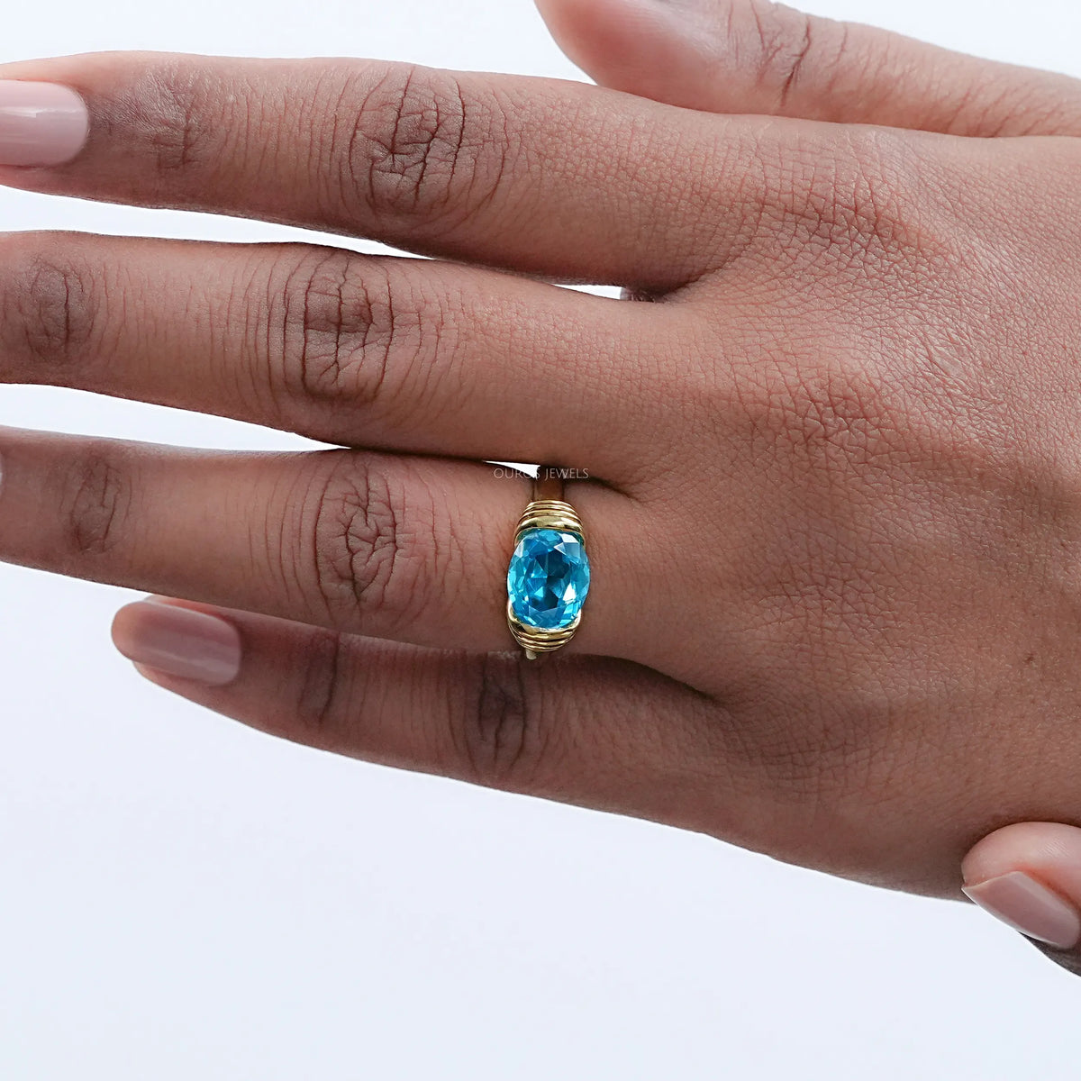 East-West Blue Oval Gemstone Solitaire Ring Rings