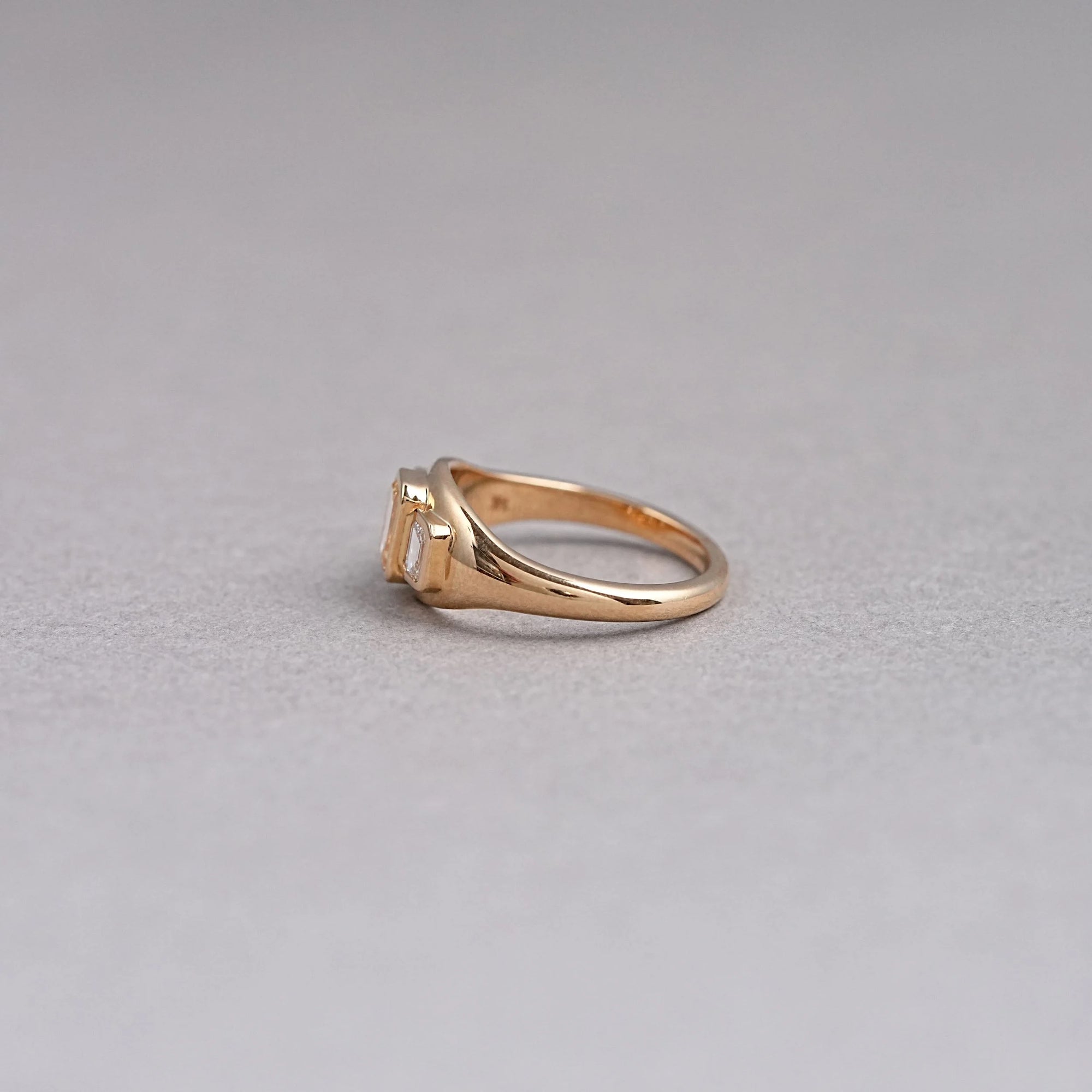 Bezel Set Yellow Emerald Cut 3 Stone Diamond Ring