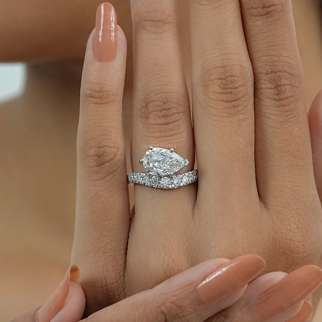 East West Pear Cut Diamond Wave Ring Ring
