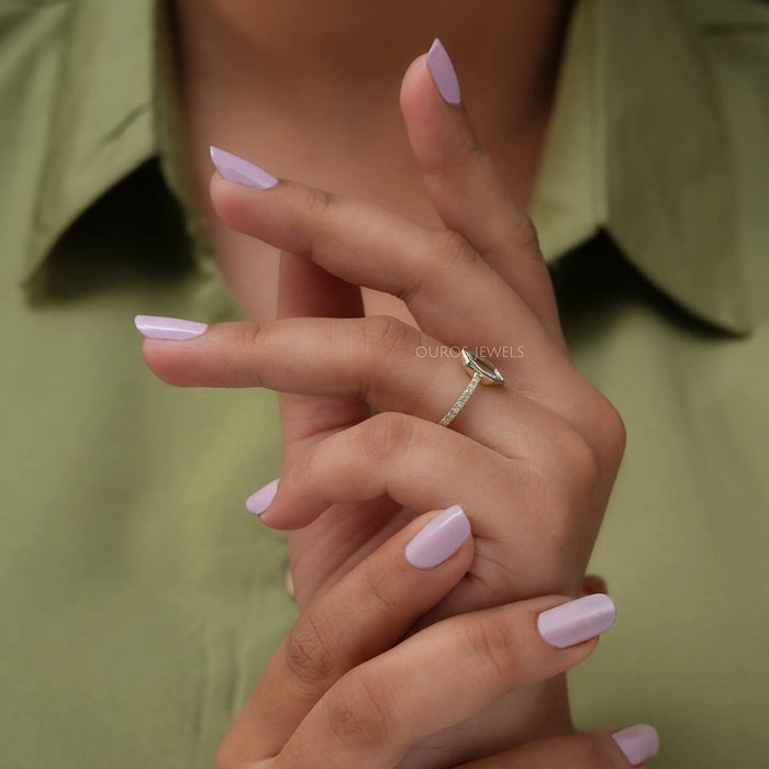 Moval Cut Solitaire Accent Diamond Ring