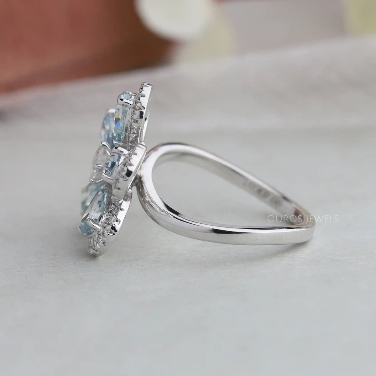 Light Blue Pear Diamond Halo Ring